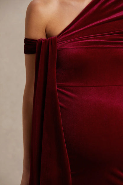 Zena Burgundy Velvet Asymmetric Neck Maternity Midi Dress With Knot And Sash Detail